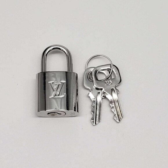 100% Authentic Louis Vuitton 1 Lock and 1 Key Silver Color - Picture 2 of 9